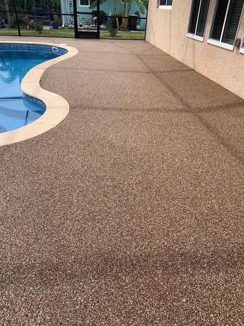 Pool deck in river rock