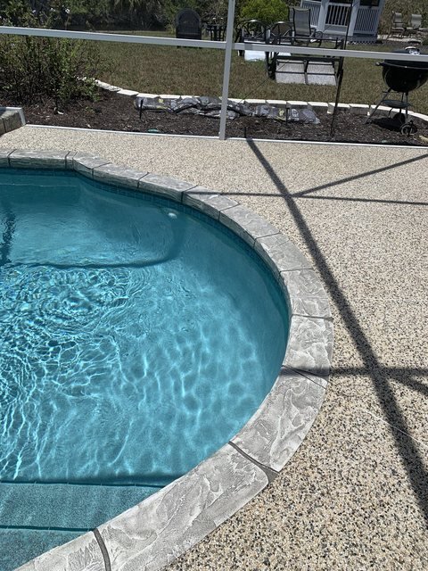 Pool deck in river rock