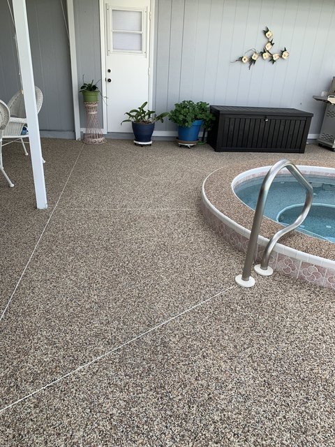Pool deck in river rock