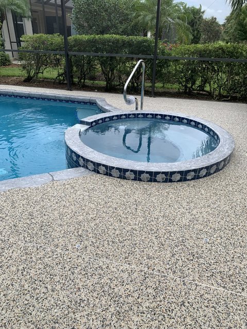 Pool deck in river rock
