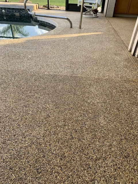 Pool deck in river rock