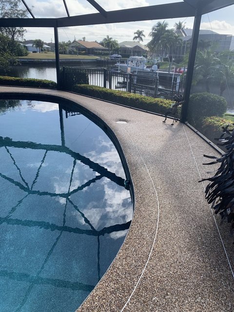 Pool deck in river rock