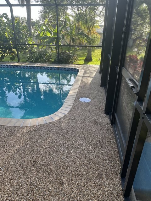 Pool deck in river rock