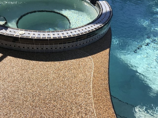 Pool coping in river rock