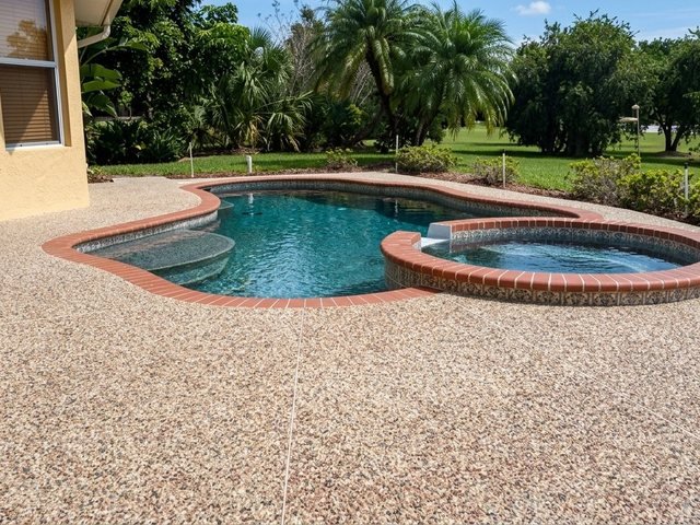Pool deck in river rock