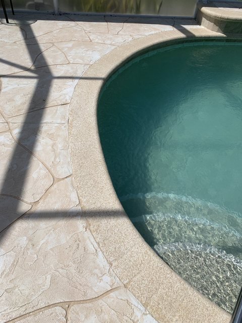 Pool coping in decorative concrete