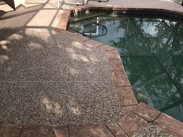 Pool deck in river rock
