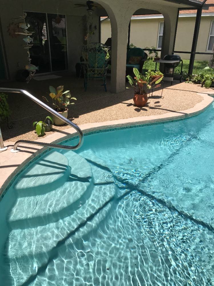 Pool deck in river rock